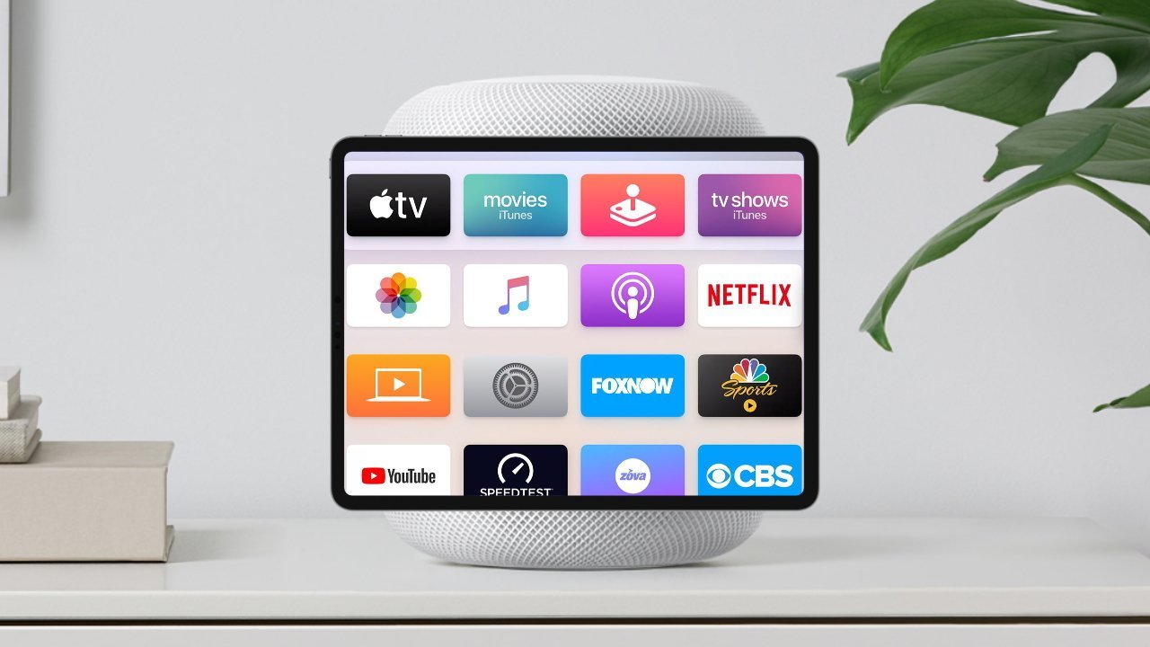 Tablet displaying streaming app icons including Apple TV, Netflix, YouTube, and more, resting on a smart speaker beside a plant on a white surface.