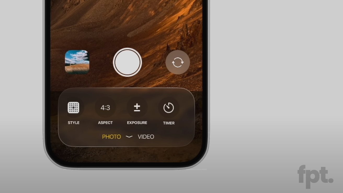 Smartphone camera interface with options for style, aspect ratio, exposure, and timer. Capture button in center, preview image thumbnail on the left. Brown landscape background.