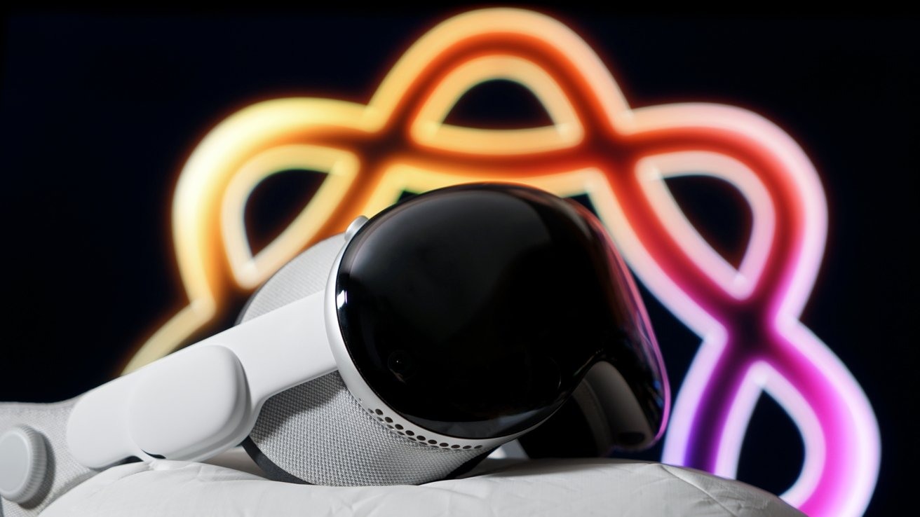Sleek virtual reality headset resting on fabric, with glowing colorful pattern in the background against a dark backdrop.