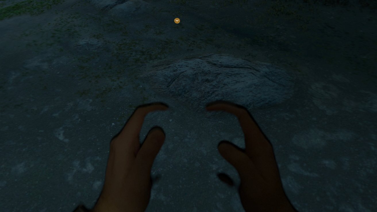 Two hands in a dimly lit, rocky environment, with a small orange circular icon in the distance.